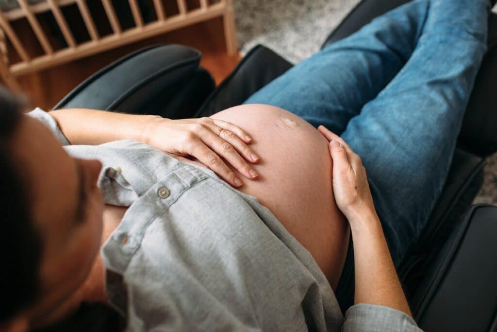 pregnant woman in her first trimester feeling fatigue