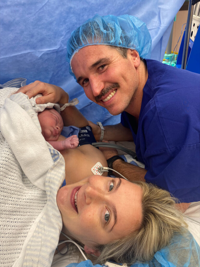 Emily in theatre after an empowering caesarean birth