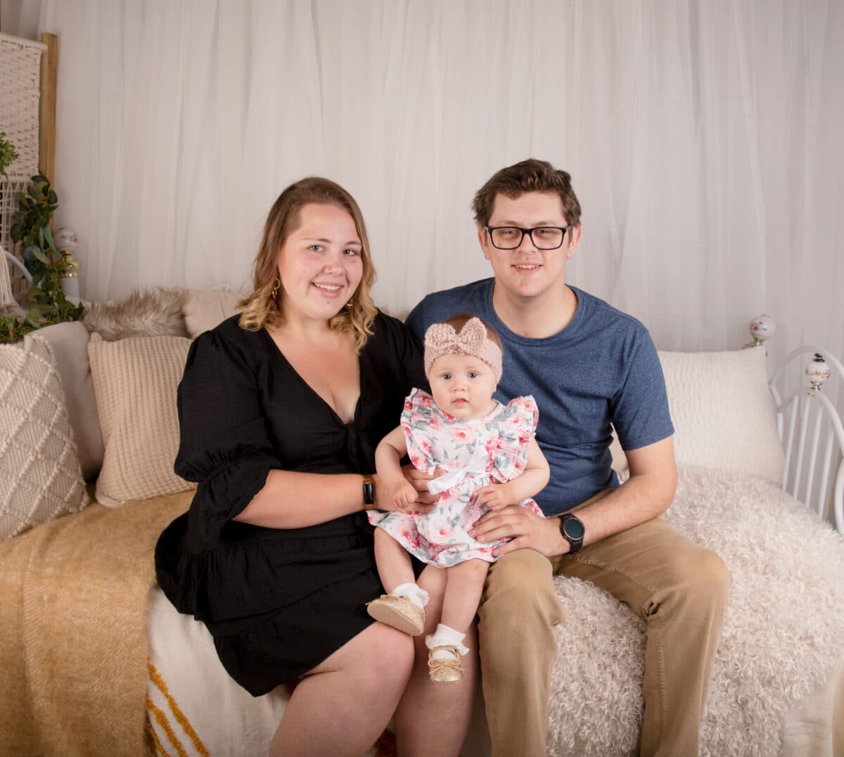 megan and her husband and baby